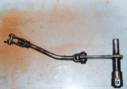 After it was cleaned with vegetable oil, it was much easier to remove this section of the master cylinder/ pedal linkage and media blast it to perfection.